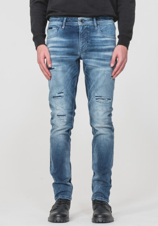 OZZY” TAPERED-FIT JEANS IN MID-WASH POWER STRETCH DENIM