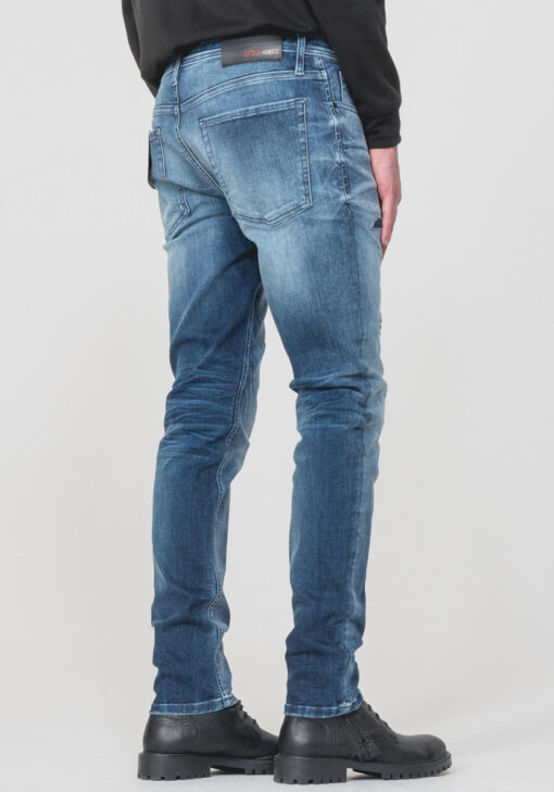 OZZY” TAPERED-FIT JEANS IN MID-WASH POWER STRETCH DENIM